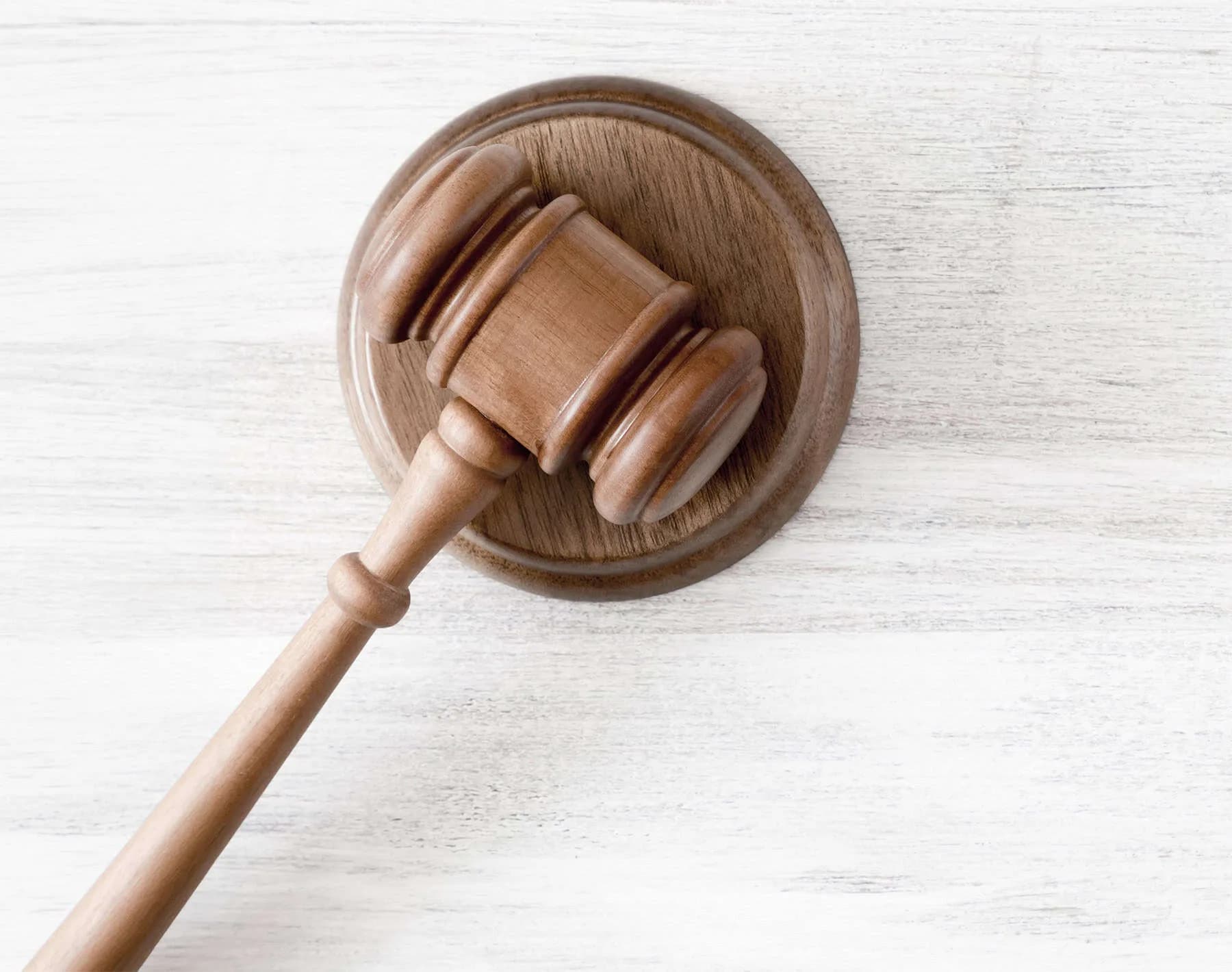 Gavel beside lien resolution documents